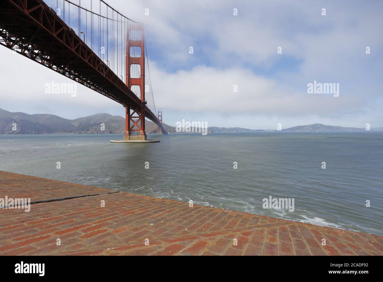 Golden Gate Bridge in San Francisco under cloudy sky Stock Photo - Alamy
