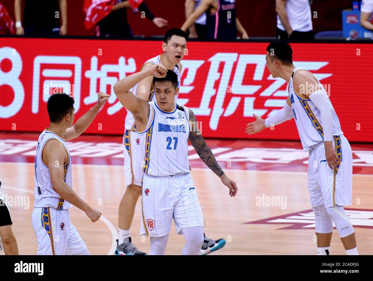 Qingdao, China's Shandong Province. 6th Aug, 2020. Players of Beijing Ducks celebrate after the semifinal match between Beijing Ducks and Guangdong Southern Tigers at the 2019-2020 Chinese Basketball Association (CBA) league in Qingdao, east China's Shandong Province, Aug. 6, 2020. Credit: Li Ziheng/Xinhua/Alamy Live News Stock Photo