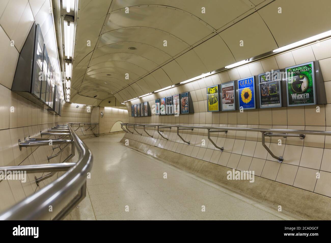 Waterloo underground tube station, long curved walkway, London, England