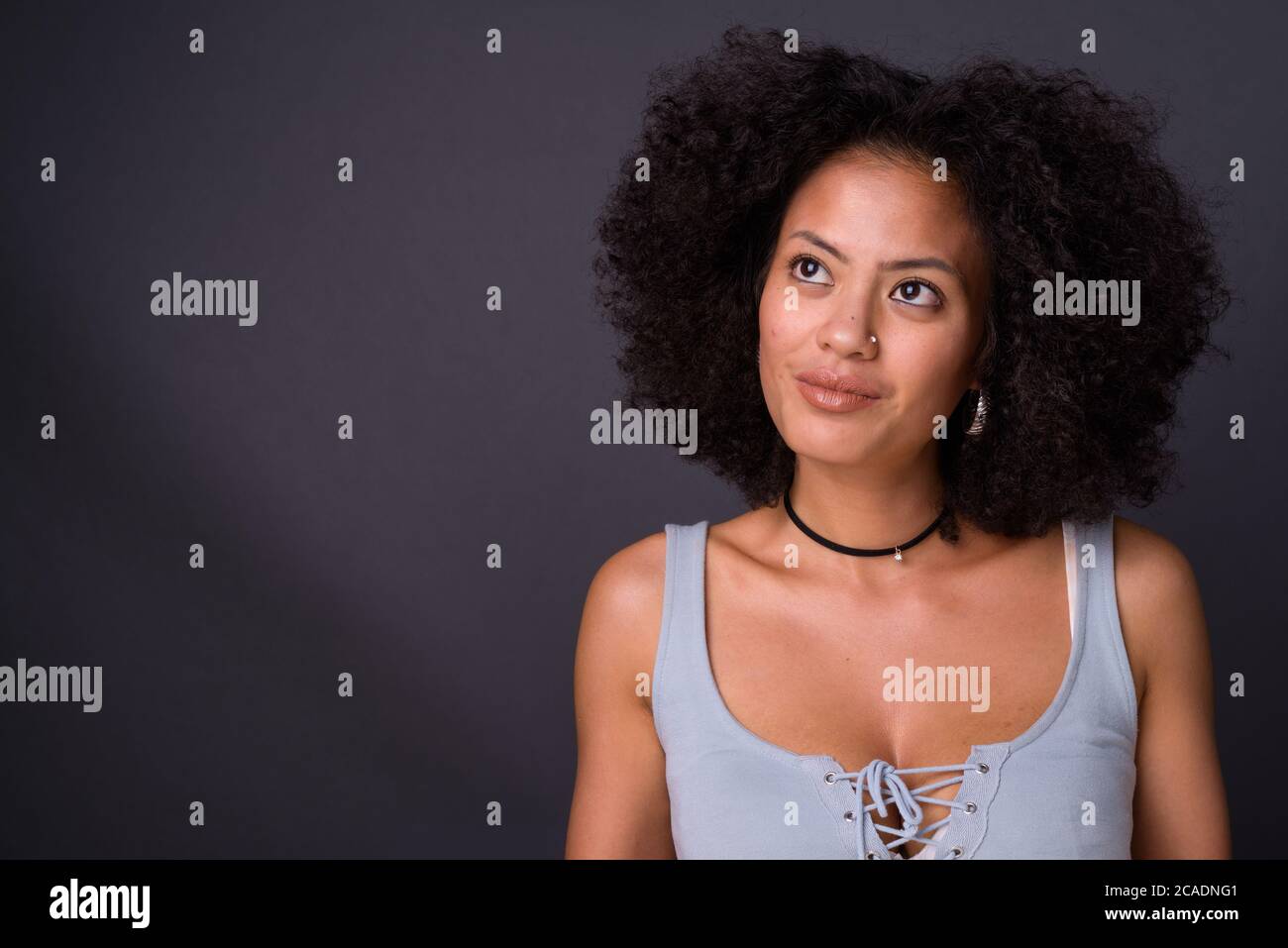 Young beautiful African woman with Afro hair Stock Photo - Alamy