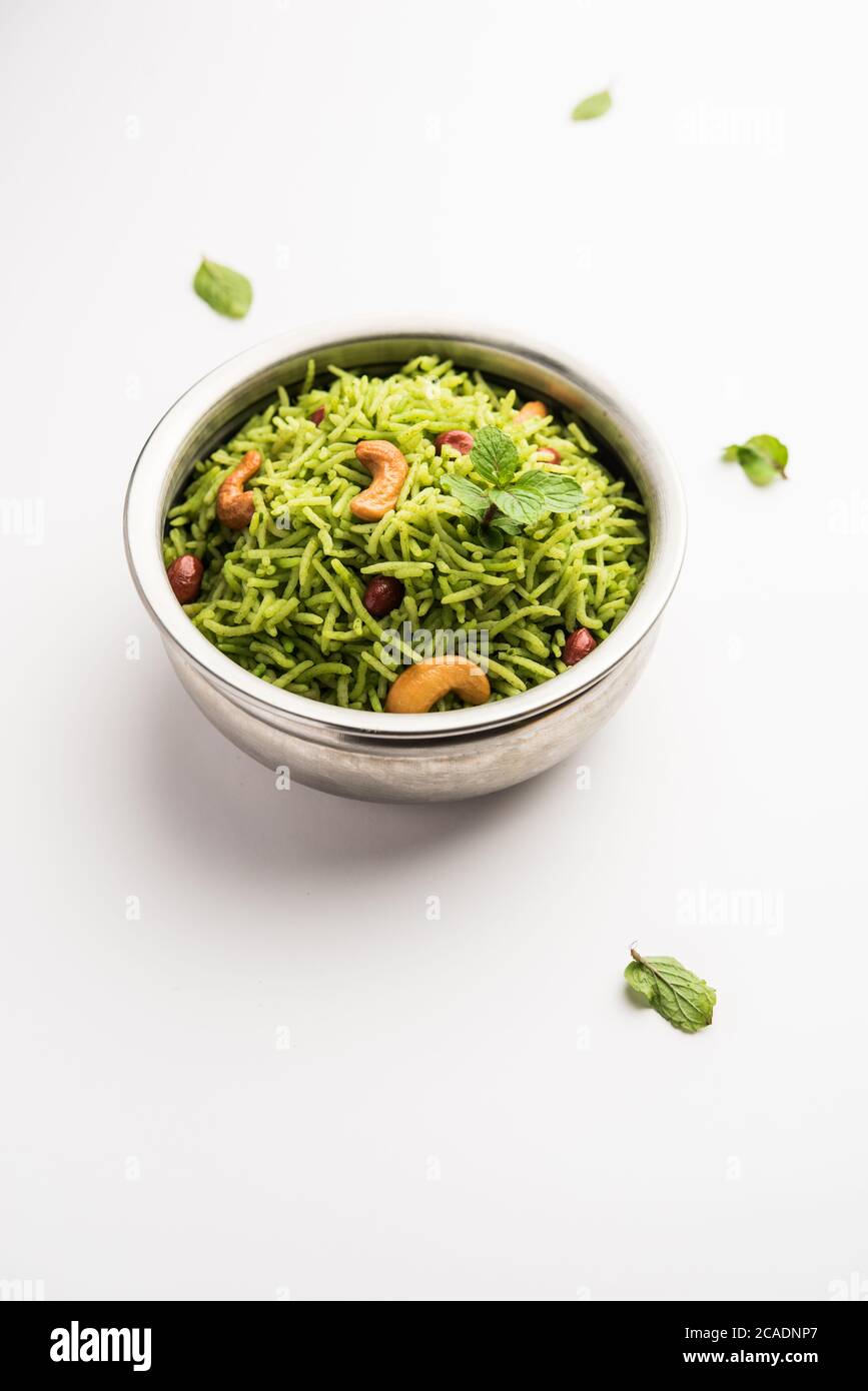 Mint Rice - Basmati rice cooked with fresh pudina leaves and garnished with Peanuts and Cashew nuts or kaju Stock Photo