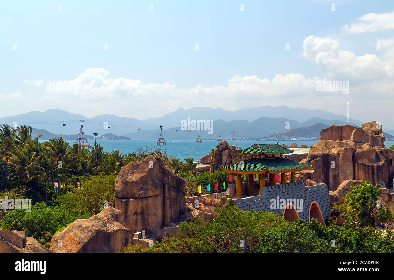 NHA TRANG, VIETNAM - FEB 12, 2015: The 3,320m long over-the-sea Cable car tower to Vinpearl Amusement Park Island cableway long rope road on water bay Stock Photo