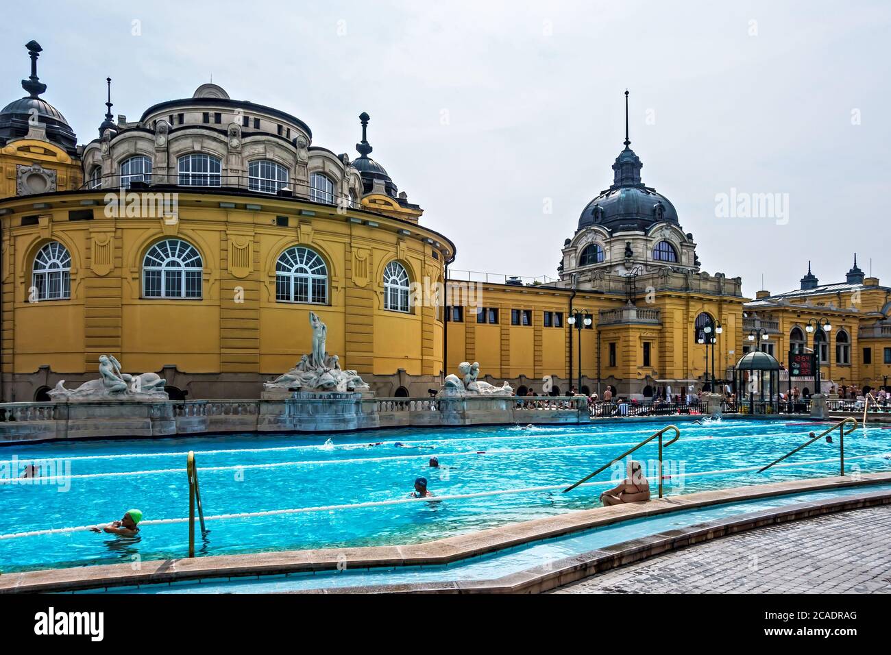 Szechenyi Thermal spa outdoor bath people public In Budapest. Szechenyi Medicinal Bath is the largest medicinal house with so many pools in Europe, Hu Stock Photo