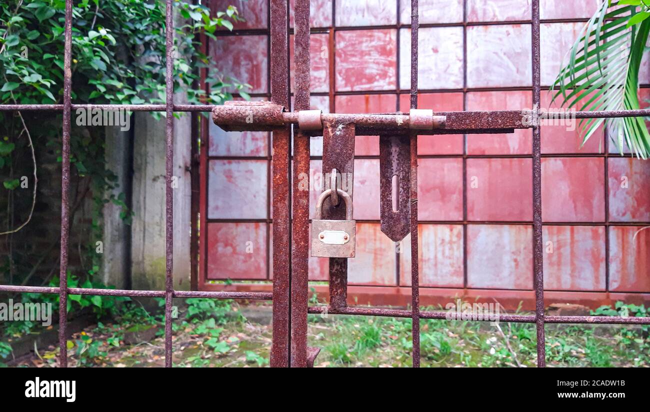 Closed Iron Gate with lock. Padlock on Iron Gate Stock Photo Alamy