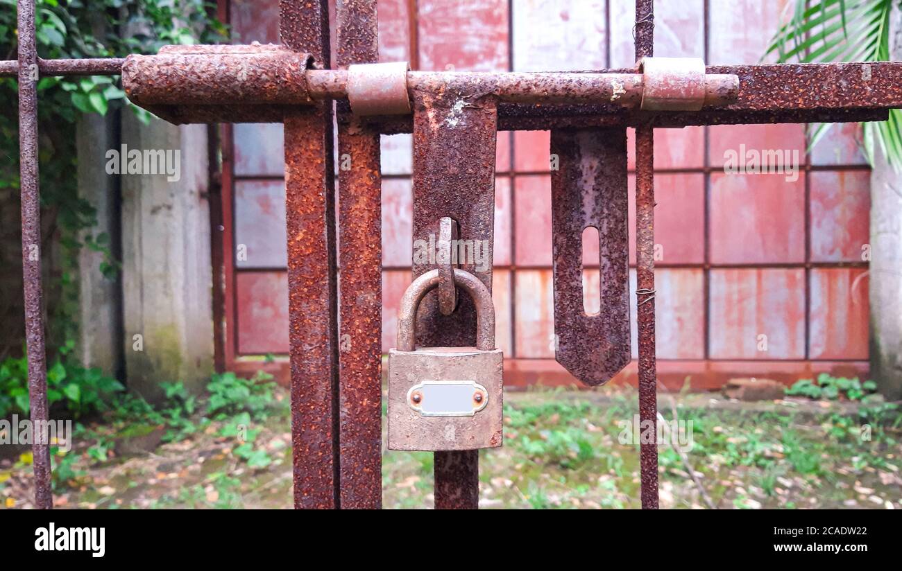 Closed Iron Gate with lock. Padlock on Iron Gate Stock Photo Alamy