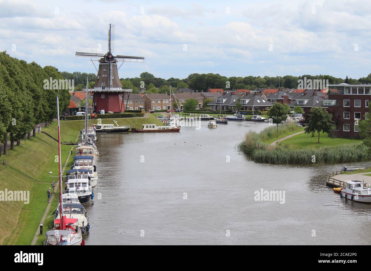 DOKKUM, NETHERLANDS, 22 JULY 2020: View from the 'Zelden rust' windmill in Dokkum looking towards 'De Hoop' windmill. Both windmills are tourist attra Stock Photo