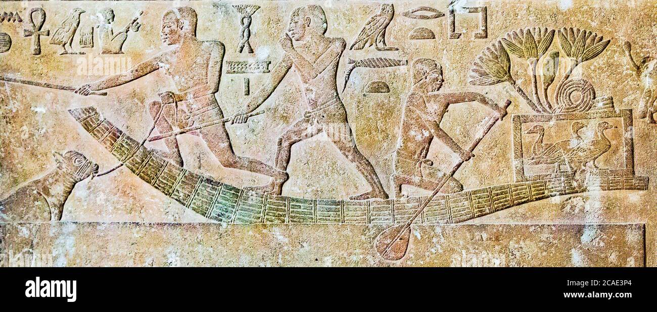 Egypt, Cairo, Egyptian Museum, from a tomb in Meidum : Sheperds on a payrus boat. One of them holds a calf, fallen in the water, by a rope. Stock Photo