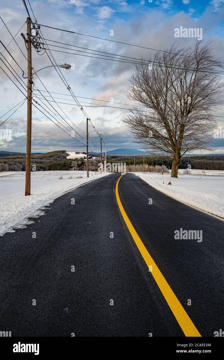 A country road on a winter day in Templeton, Massachusetts Stock Photo