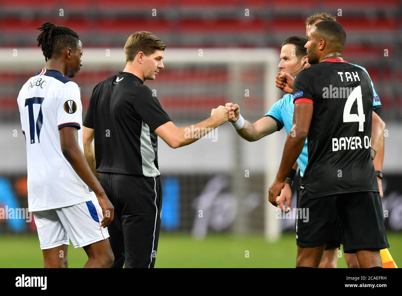 Rangers head coach Steven Gerrard (left) bumps costs with referee Danny