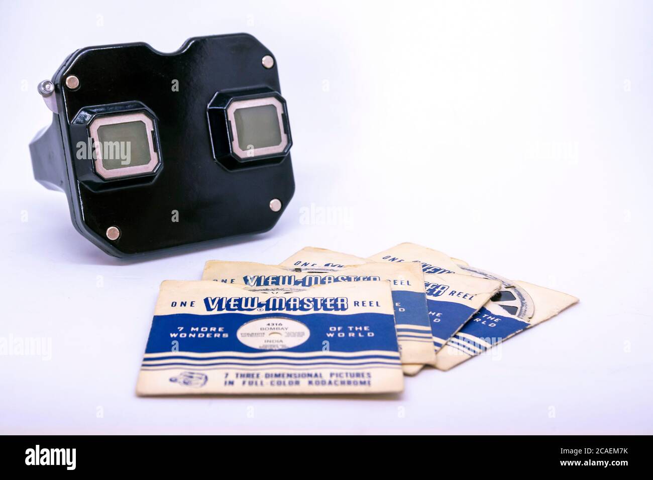 View Master, retro 3D photo viewer and it's reel on white background. Stock Photo