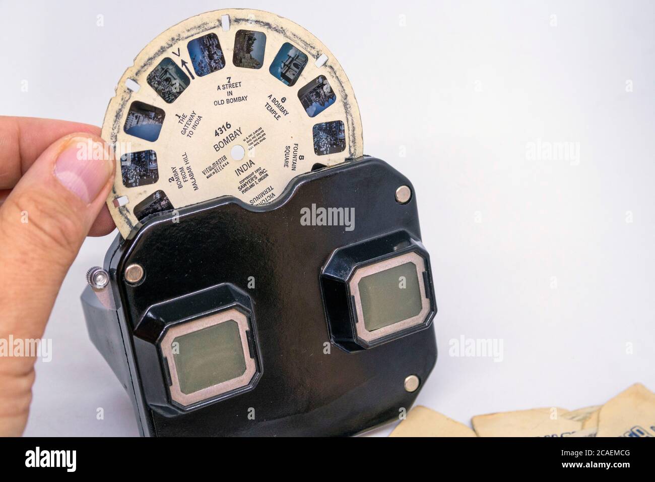 View Master, retro 3D photo viewer and it's reel on white background Stock  Photo - Alamy