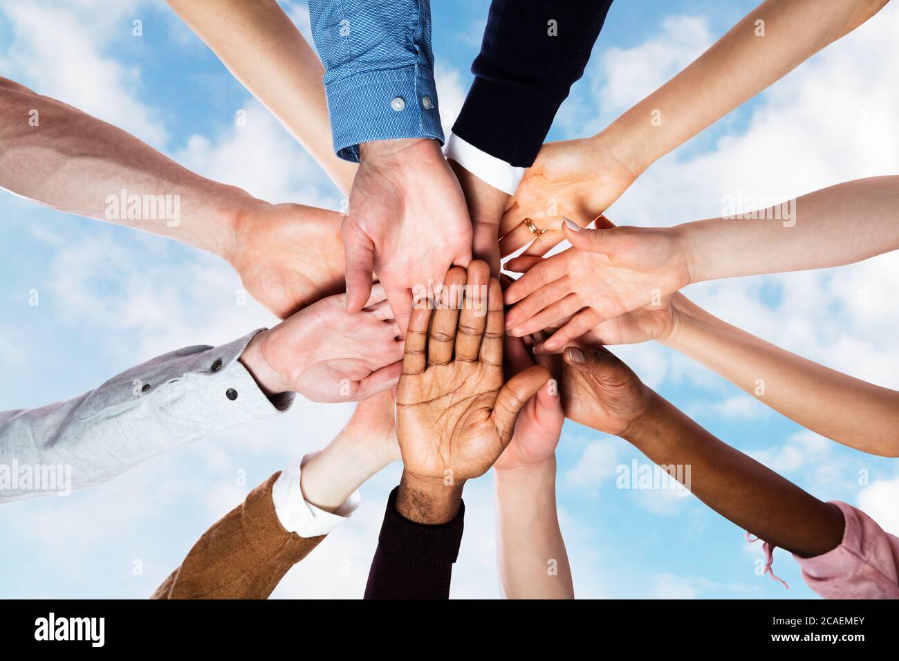 Team Spirit Business Huddle. People Diversity. Group Together Stock Photo