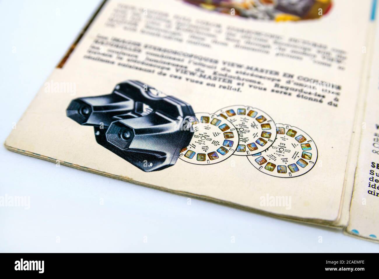 View Master, retro 3D photo viewer and it's brochure on white background. Stock Photo