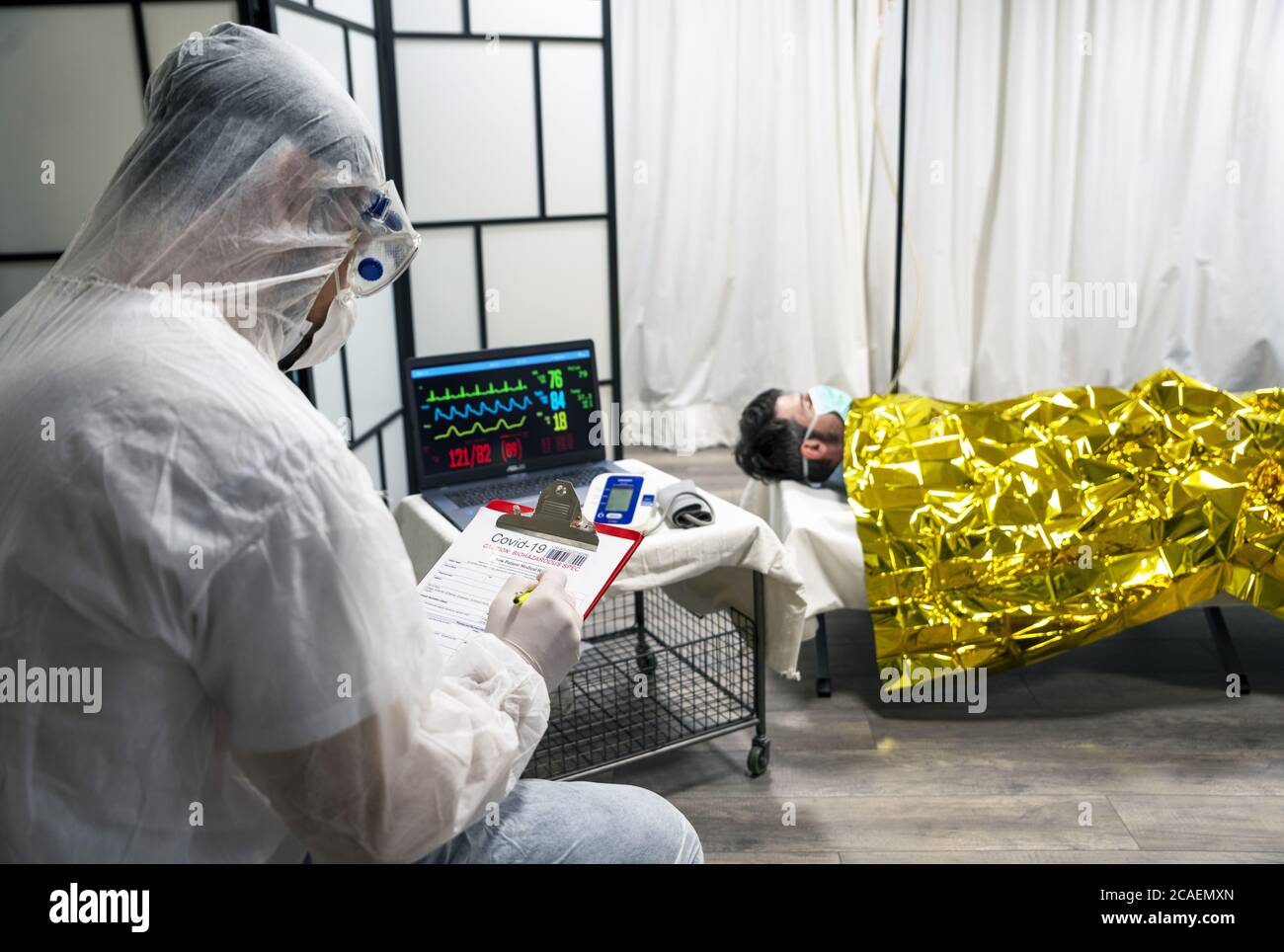 Alert pandemic Covid19. Doctor in protective white suit, glasses and