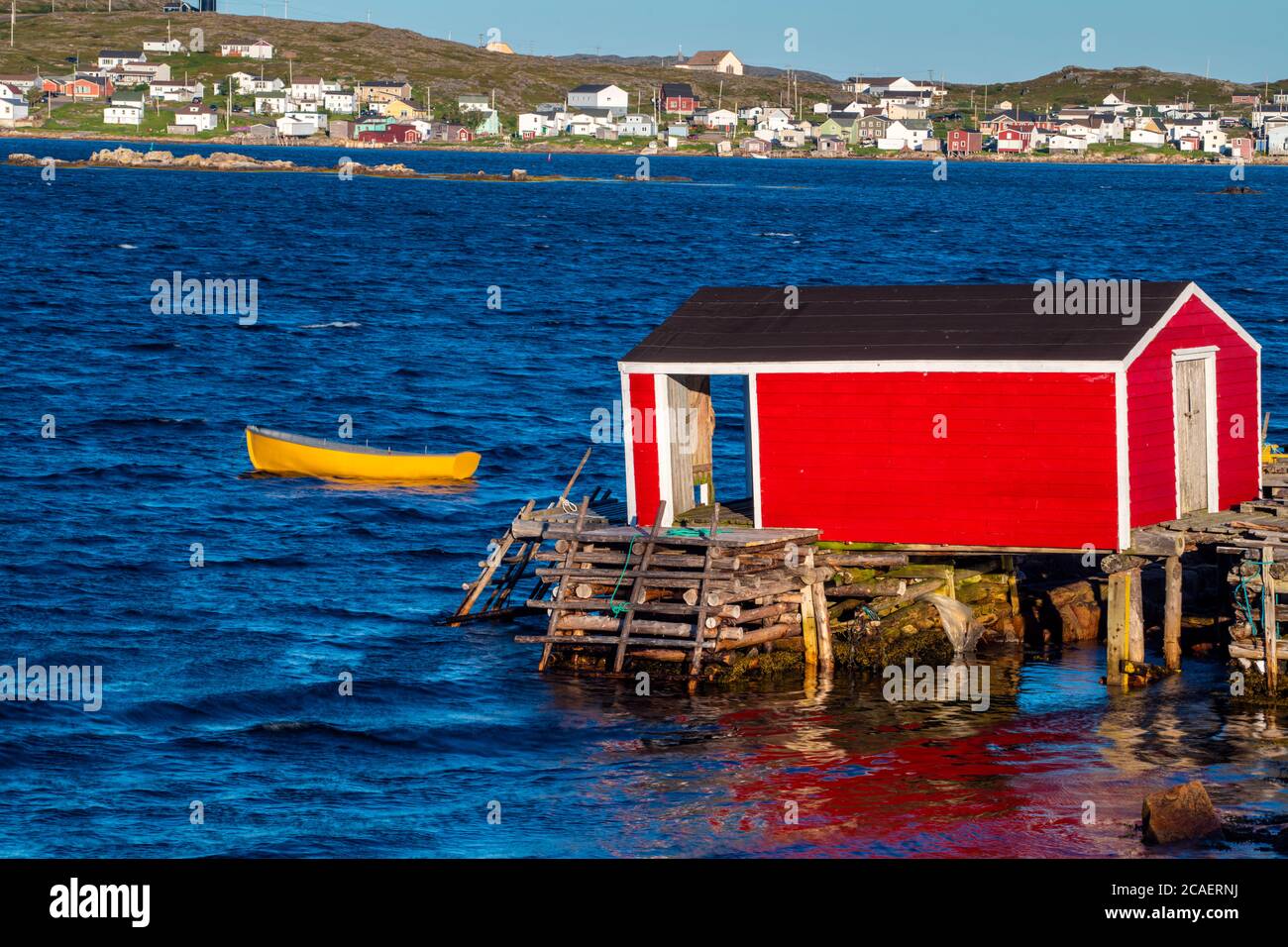 Red 'stage' building and yellow dory, Joe Batt's Arm, Newfoundland and