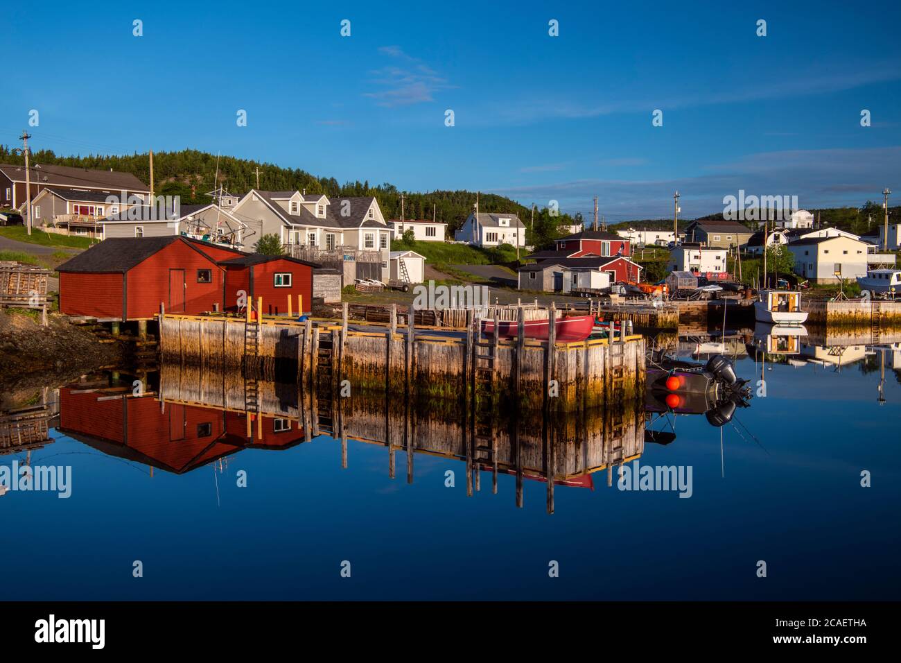 Reflections in the Inner Harbour, Robert's Arm, Newfoundland and Labrador NL, Canada Stock Photo