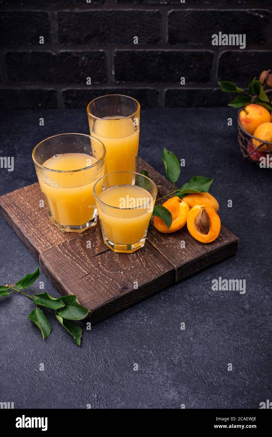 Apricot juice in glass. Healthy drink Stock Photo Alamy
