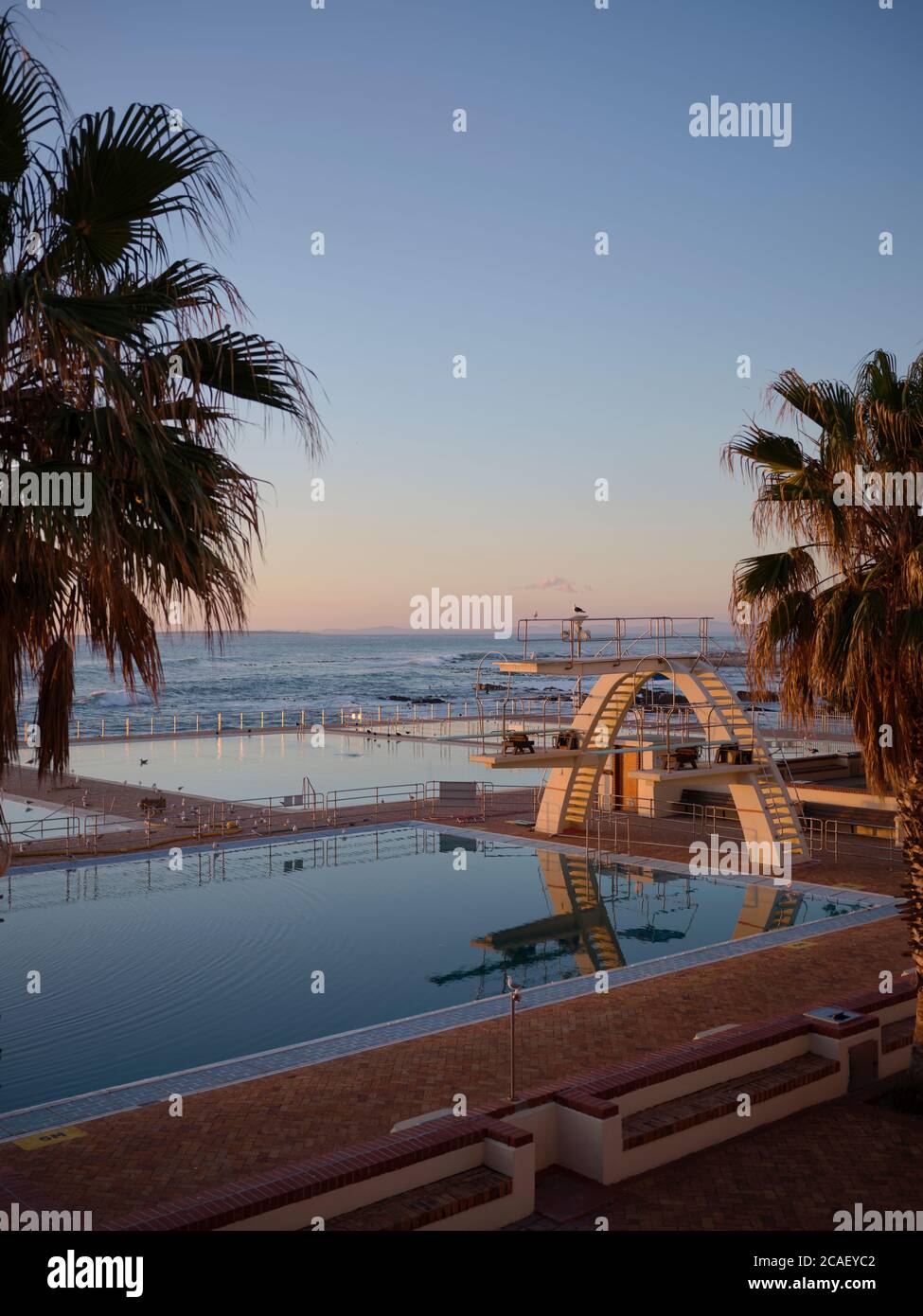 Elevated view of the public swimming pool at Sea Point in Cape Town. This photo was taken during the Covid-19 outbreak in 2020 and under lockdown. Stock Photo