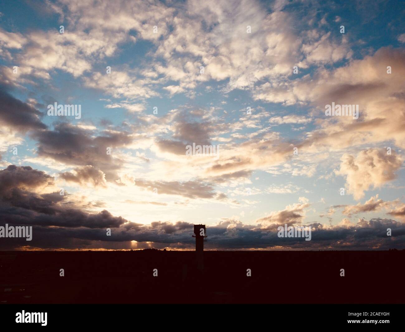 sunset sky with clouds background Stock Photo - Alamy