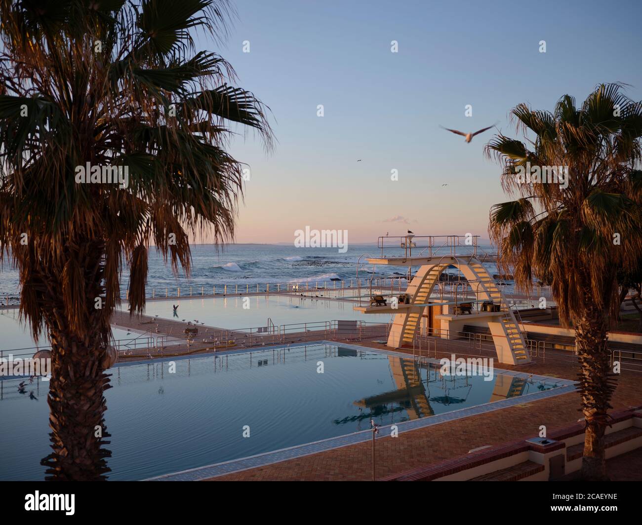 Elevated view of the public swimming pool at Sea Point in Cape Town. This photo was taken during the Covid-19 outbreak in 2020 and under lockdown. Stock Photo