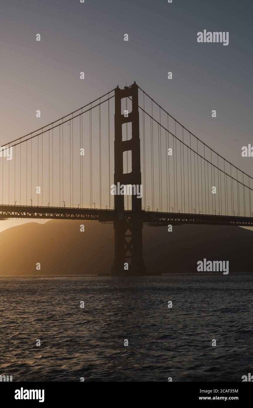 Vertical shot of a Golden Gate Bridge during the daytime in the USA ...