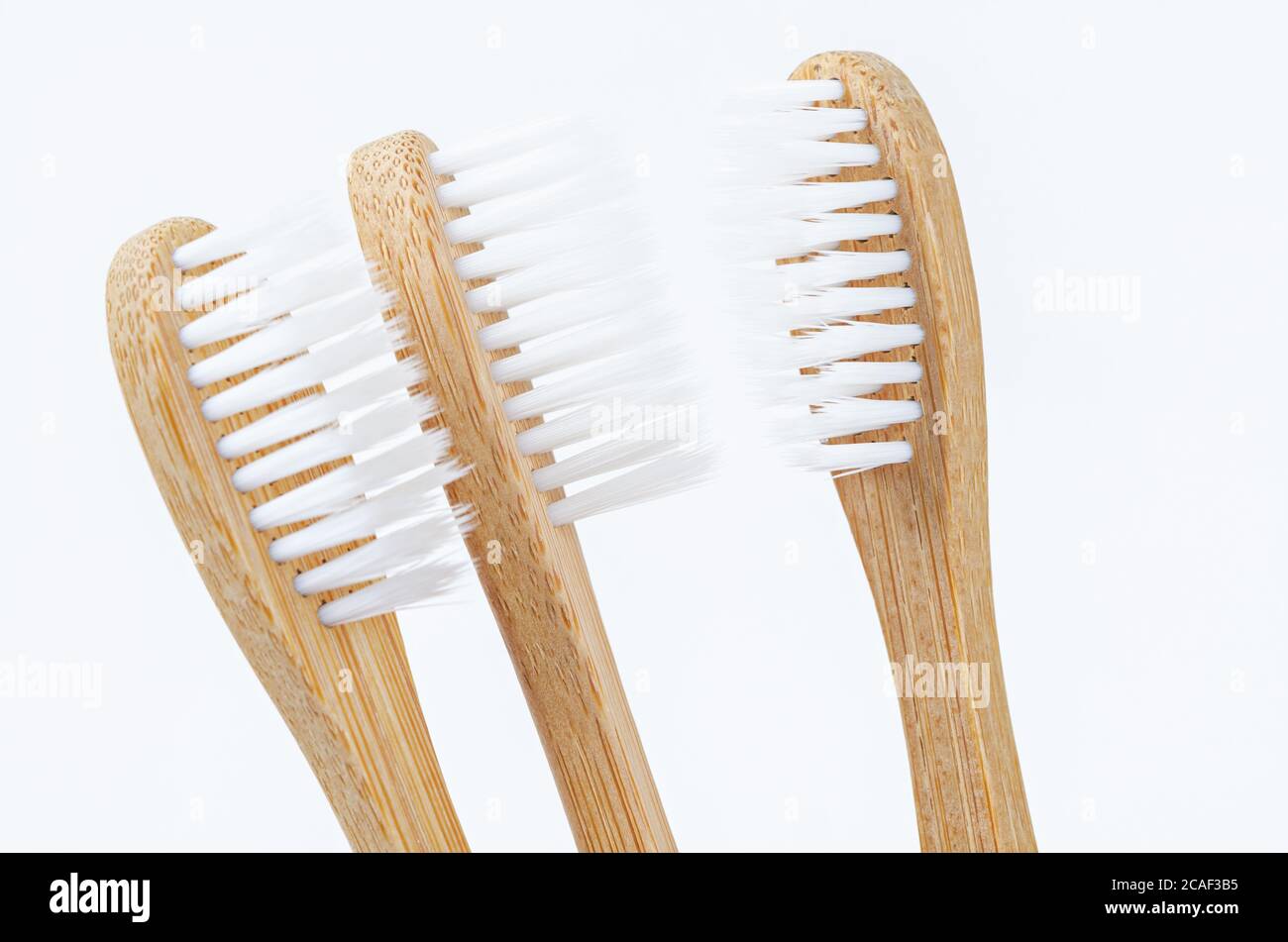 Bamboo toothbrush on white background Stock Photo
