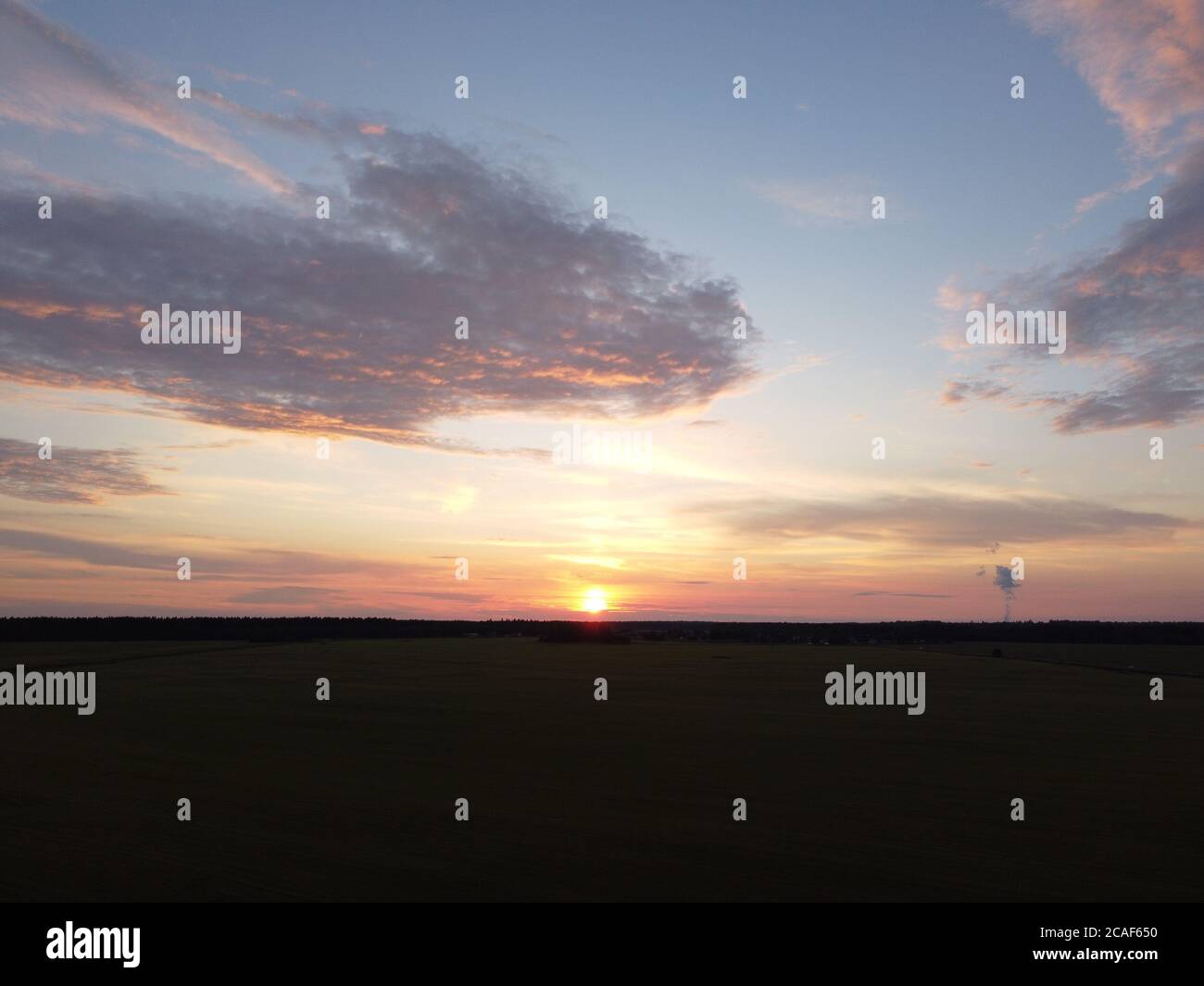 sunset sky with clouds background Stock Photo - Alamy