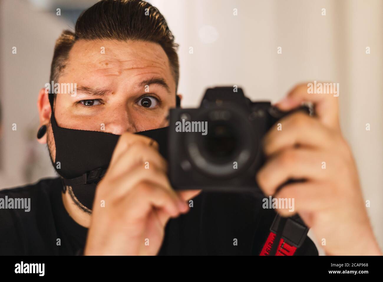 Black woman in mask taking hi-res stock photography and images - Alamy