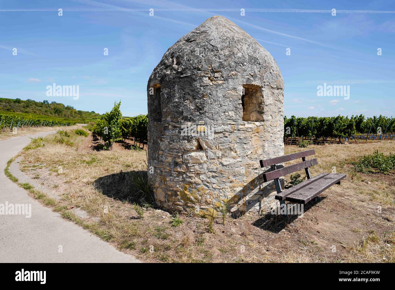 29 July 2020, Rhineland-Palatinate, Bockenheim an der Weinstraße: A trullo, also known as a round house, stands in the vineyards between the villages of Wachenheim and Bockenheim an der Weinstraße. (to dpa "Trullo shines in the vineyard") Photo: Uwe Anspach/dpa Stock Photo