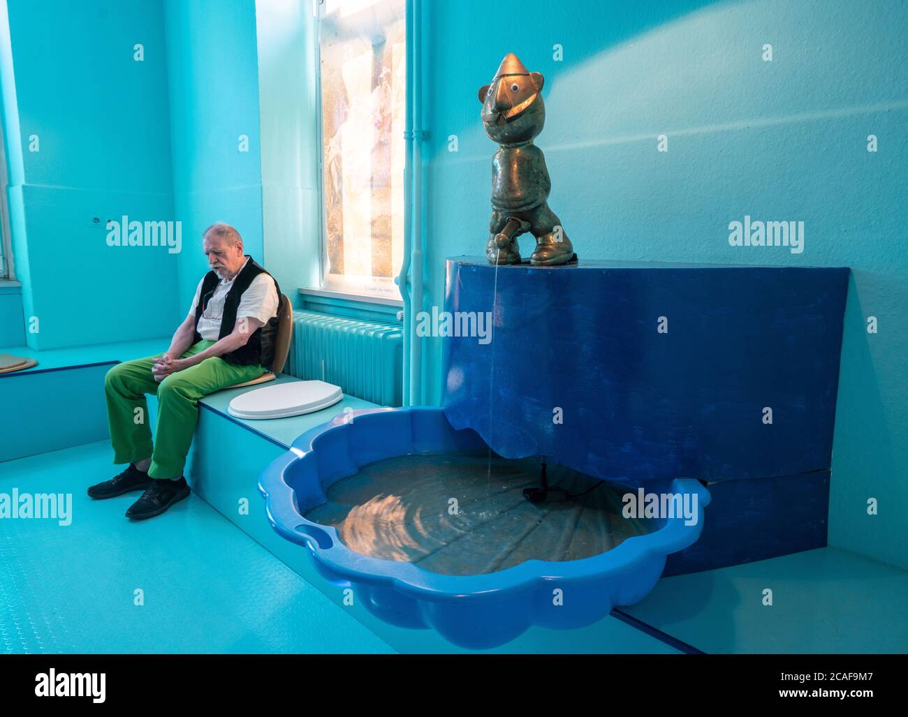 Wiesbaden Germany 22nd July Collector And Museum Owner Michael Berger Sits In One Of The Eight Rooms Of The Harlekinaum In The Erbenheim District Of Berlin On One Of The Toilet Wiesbaden Germany 22nd July Collector And Museum Owner Michael Berger Sits In One Of The Eight Rooms Of The Harlekinaum In The Erbenheim District Of Berlin On One Of The Toilet