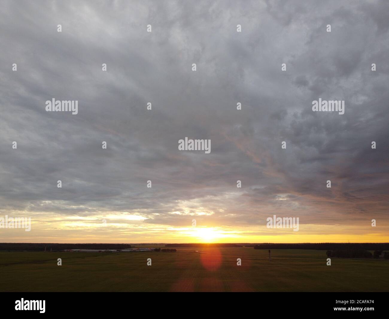 sunset sky with clouds background Stock Photo - Alamy