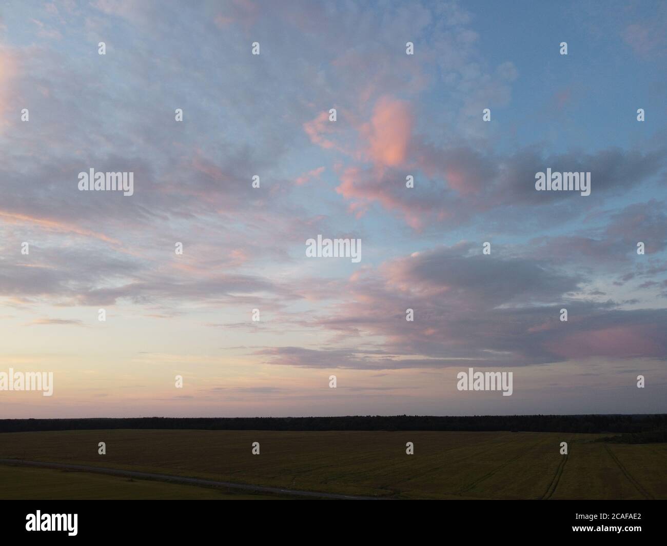 sunset sky with clouds background Stock Photo - Alamy
