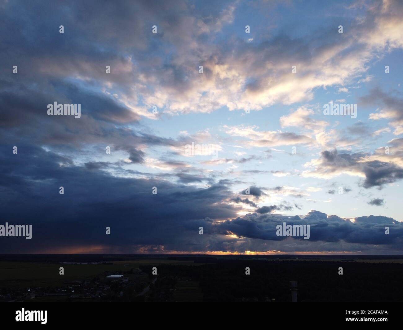 sunset sky with clouds background Stock Photo - Alamy