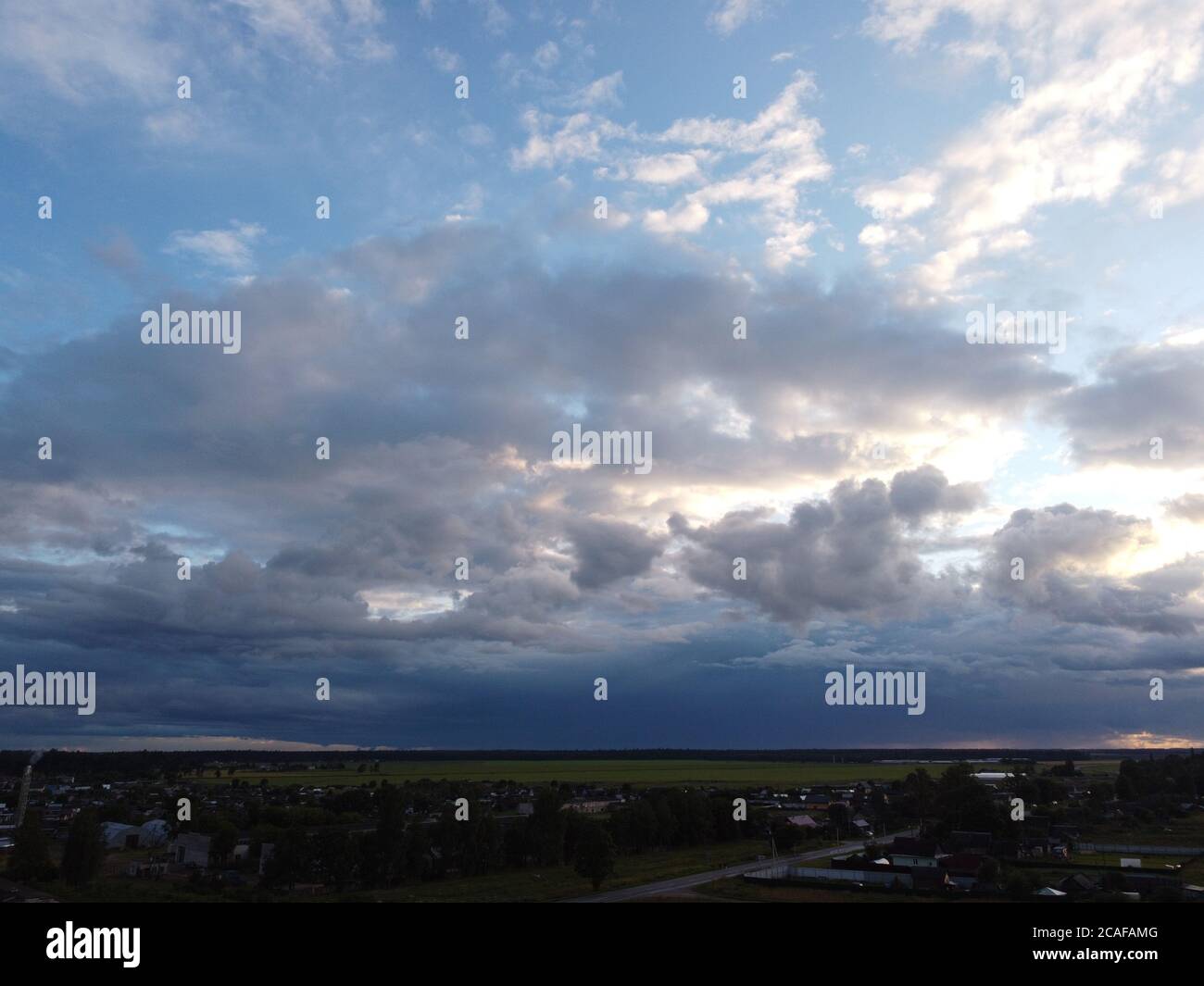 sunset sky with clouds background Stock Photo - Alamy