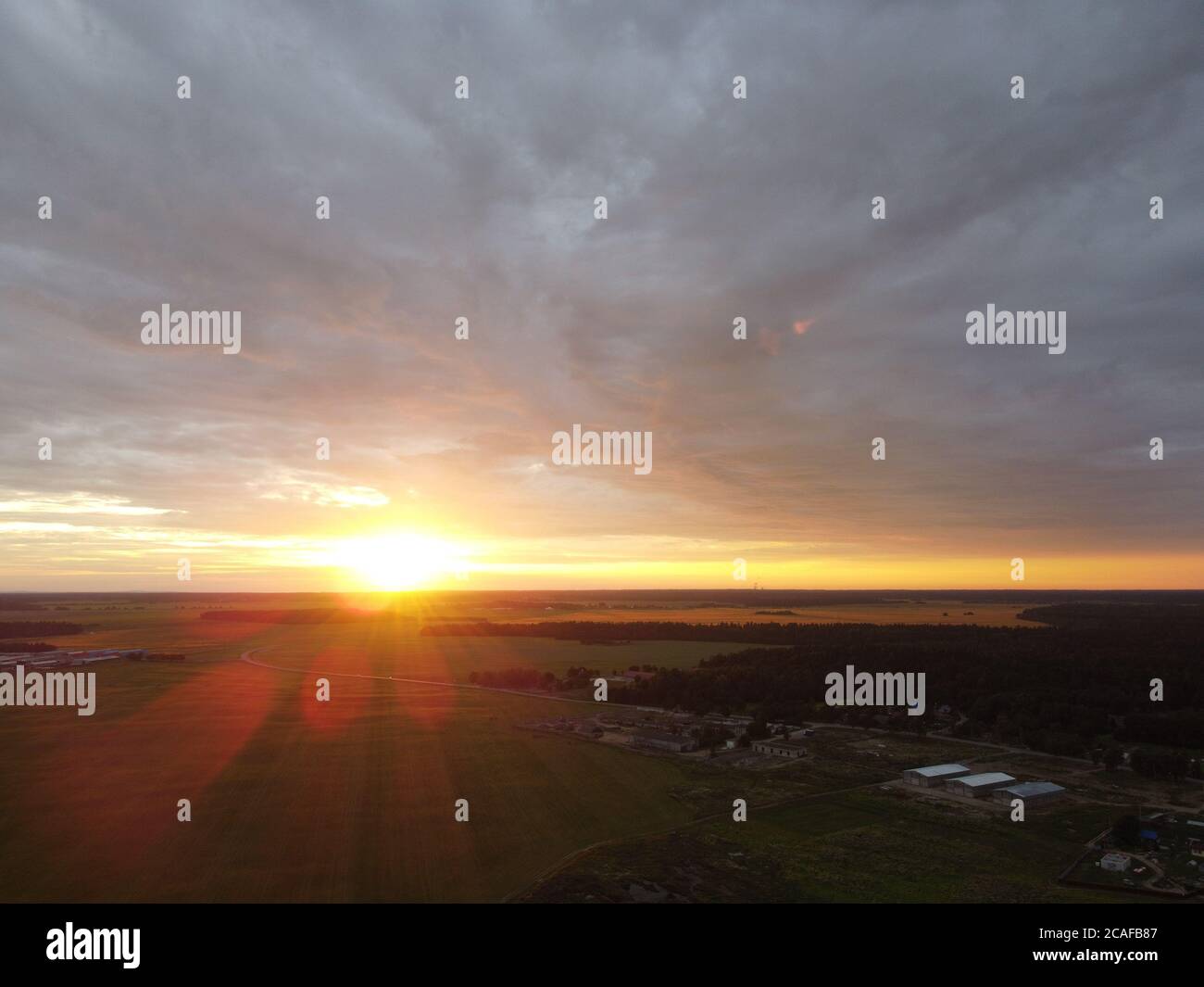 sunset sky with clouds background Stock Photo - Alamy