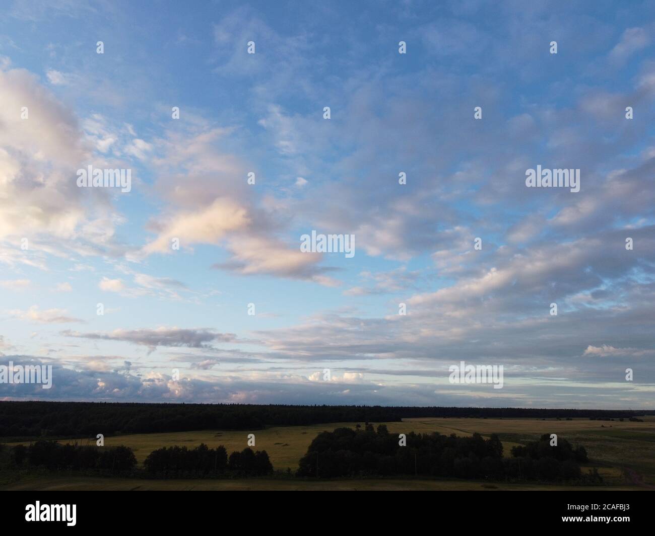 sunset sky with clouds background Stock Photo - Alamy