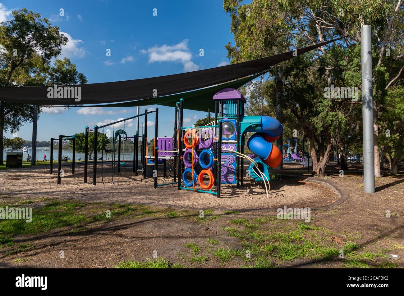 Sydney NSW Australia July 24th 2020 - Colorful Playground Equipment at Brays Bay Reserve on a sunny winter afternoon Stock Photo