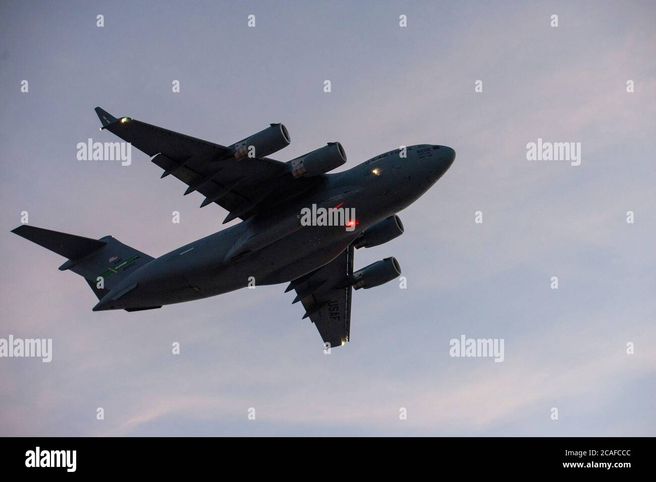 A U.S. Air Force C-17 Globemaster III takes off from Al Udeid Air Base, Qatar, Aug. 6, 2020, carrying humanitarian aid supplies bound for Beirut, Lebanon. U.S. Central Command is coordinating with the Lebanese Armed Forces and U.S. Embassy-Beirut to transport critical supplies as quickly as possible to support the needs of the Lebanese people. (U.S. Air Force photo by Staff Sgt. Heather Fejerang) Stock Photo