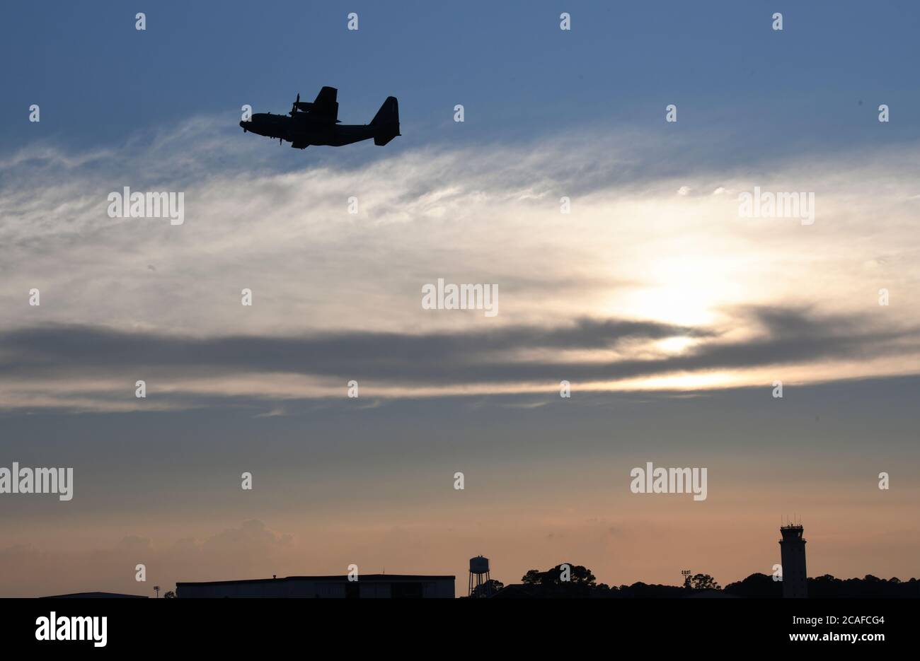 An AC-130J Ghostrider gunship with the 73rd Special Operations Squadron flies over the flightline at Hurlburt Field, Florida, Aug. 5, 2020. The AC-130J is a highly modified aircraft containing advanced features with its primary missions of close air support, air interdiction and armed reconnaissance. (U.S. Air Force photo by Airman 1st Class Hailey M. Ziegler) Stock Photo