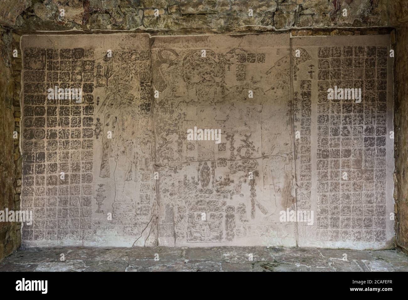 A carved stone panel in the Temple of the Cross showing K’inich Kan B
