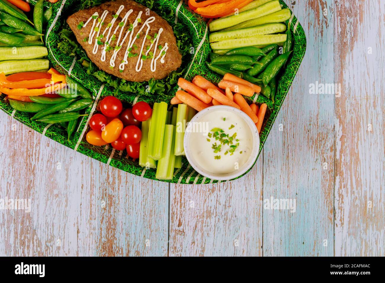 Healthy vegetable platter with meatloaf and ranch, dipping sauce Stock