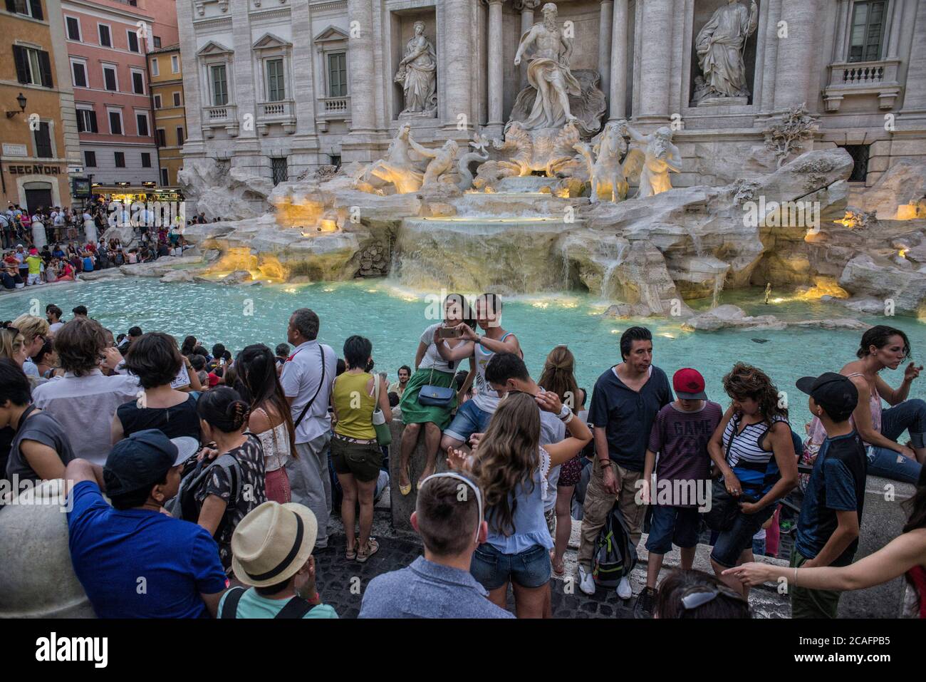 Europe - Italy, capital city Rome: Tourist at the Trevi Fountain which is one of the most popular spots in Rome. Stock Photo