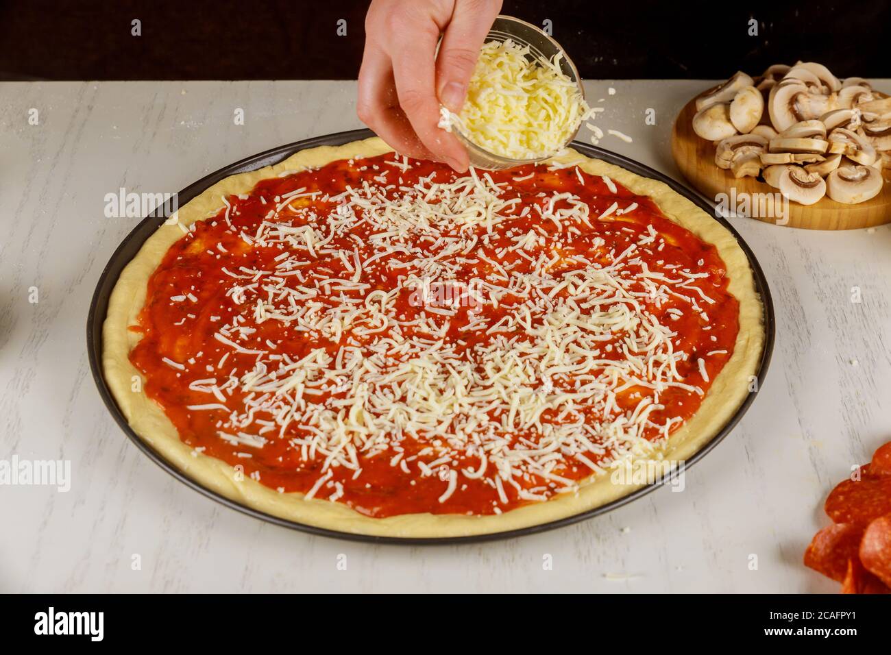Shredded Mozzarella Cheese On Pizza