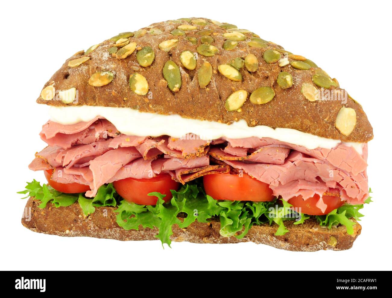 Pastrami and pumpernickel bread sandwich isolated on a white background