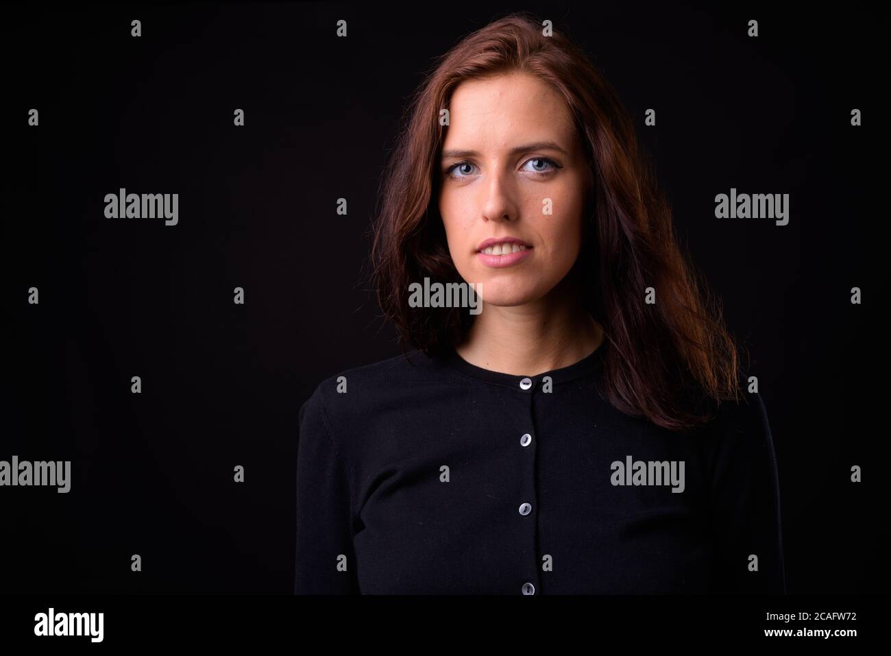 Portrait of young beautiful woman with brown hair Stock Photo - Alamy