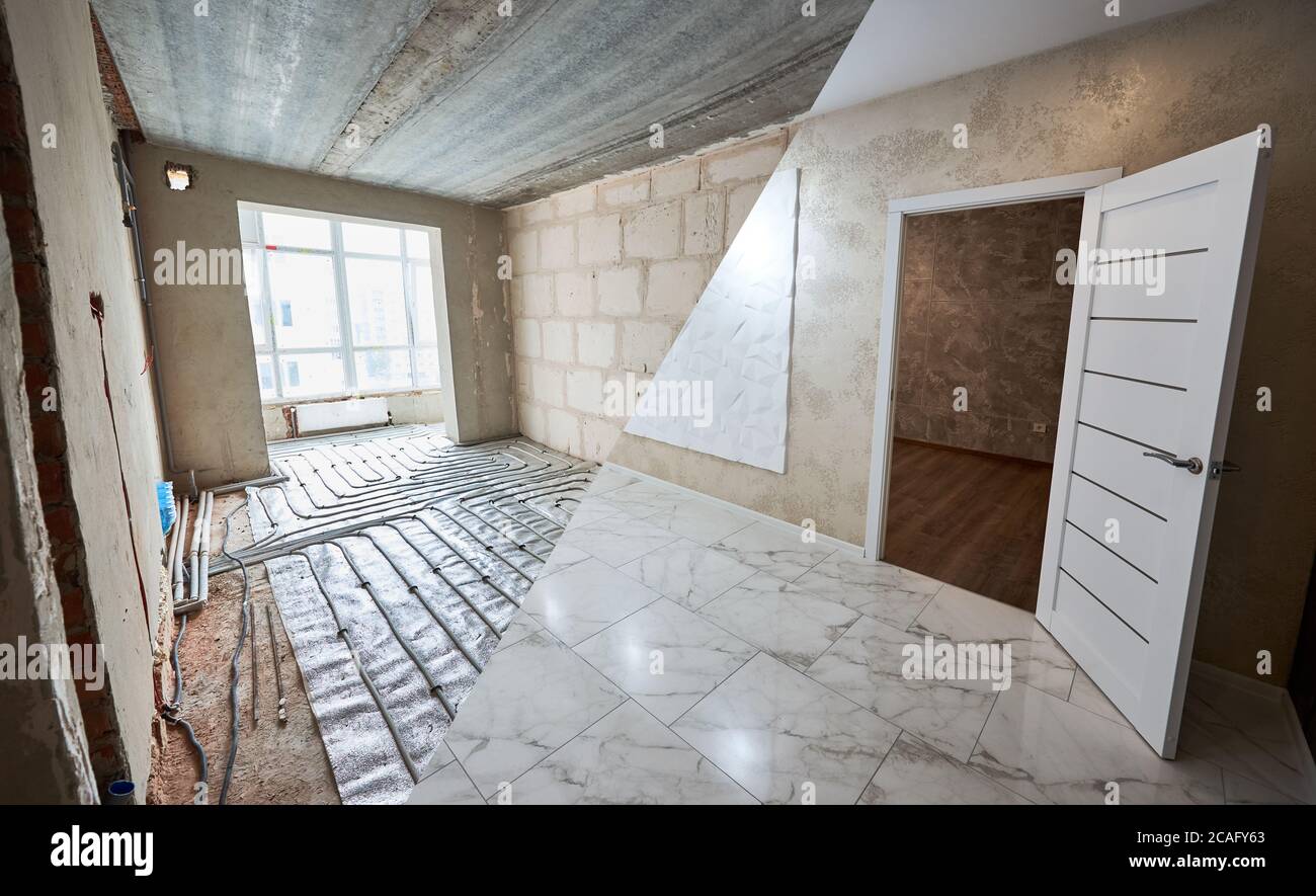 Comparison of new renovated room with open door and old place with large window and underfloor heating pipes. Modern apartment before and after restoration. Concept of home renovation. Stock Photo