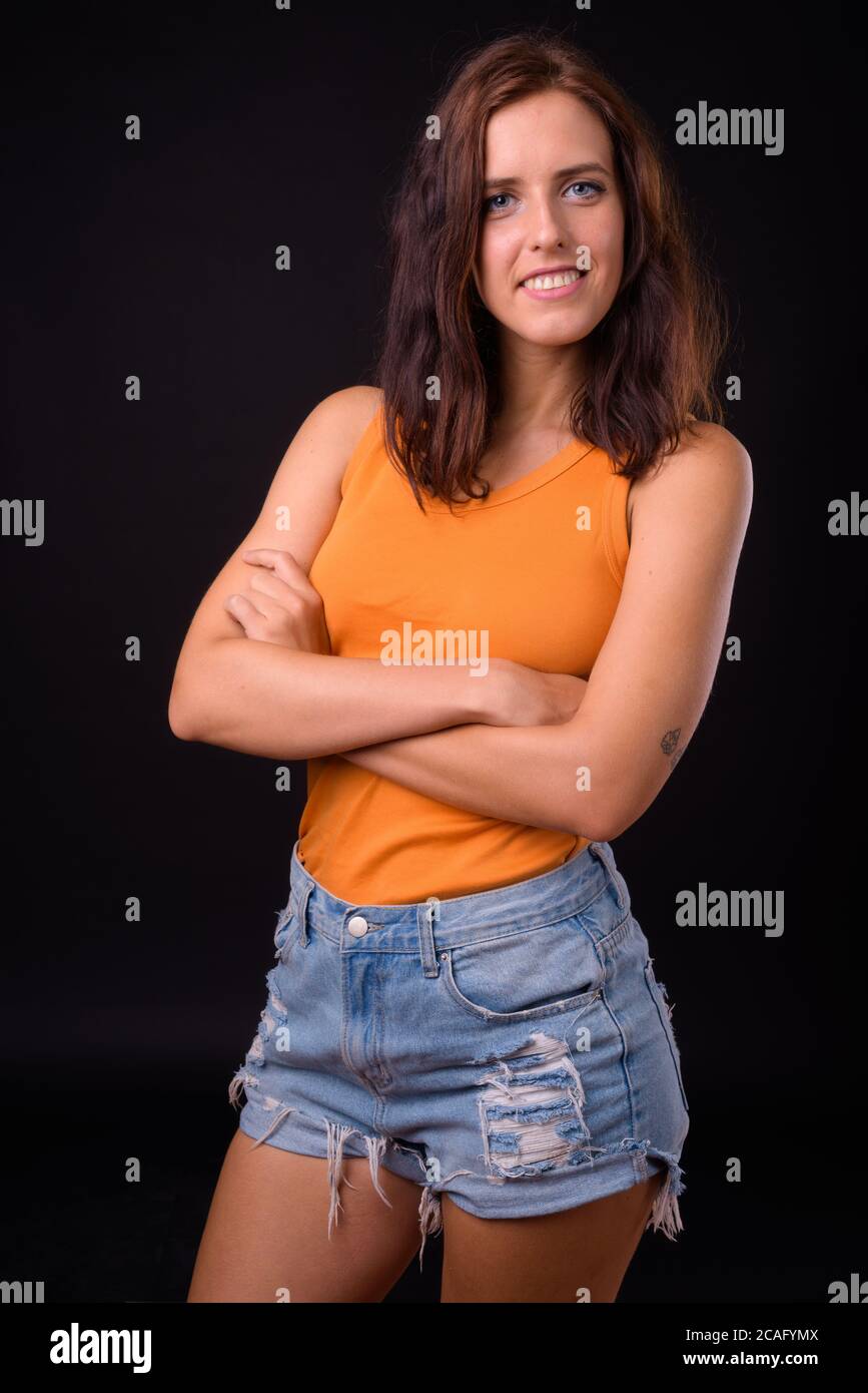 Portrait of happy young beautiful woman with brown hair Stock Photo - Alamy