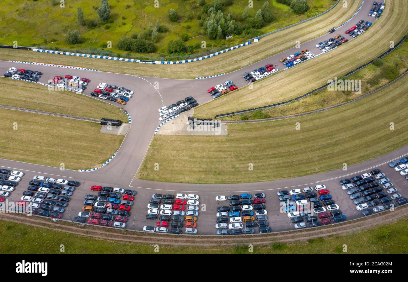 Thousands of cars lined up at the Rockingham Motor Speedway site in Corby, Northamptonshire