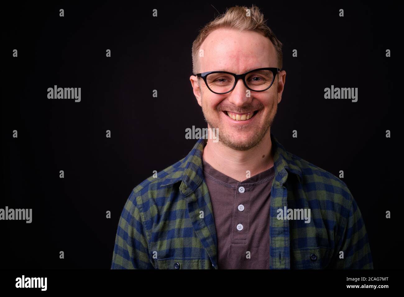 Portrait of happy handsome man with blond hair Stock Photo - Alamy