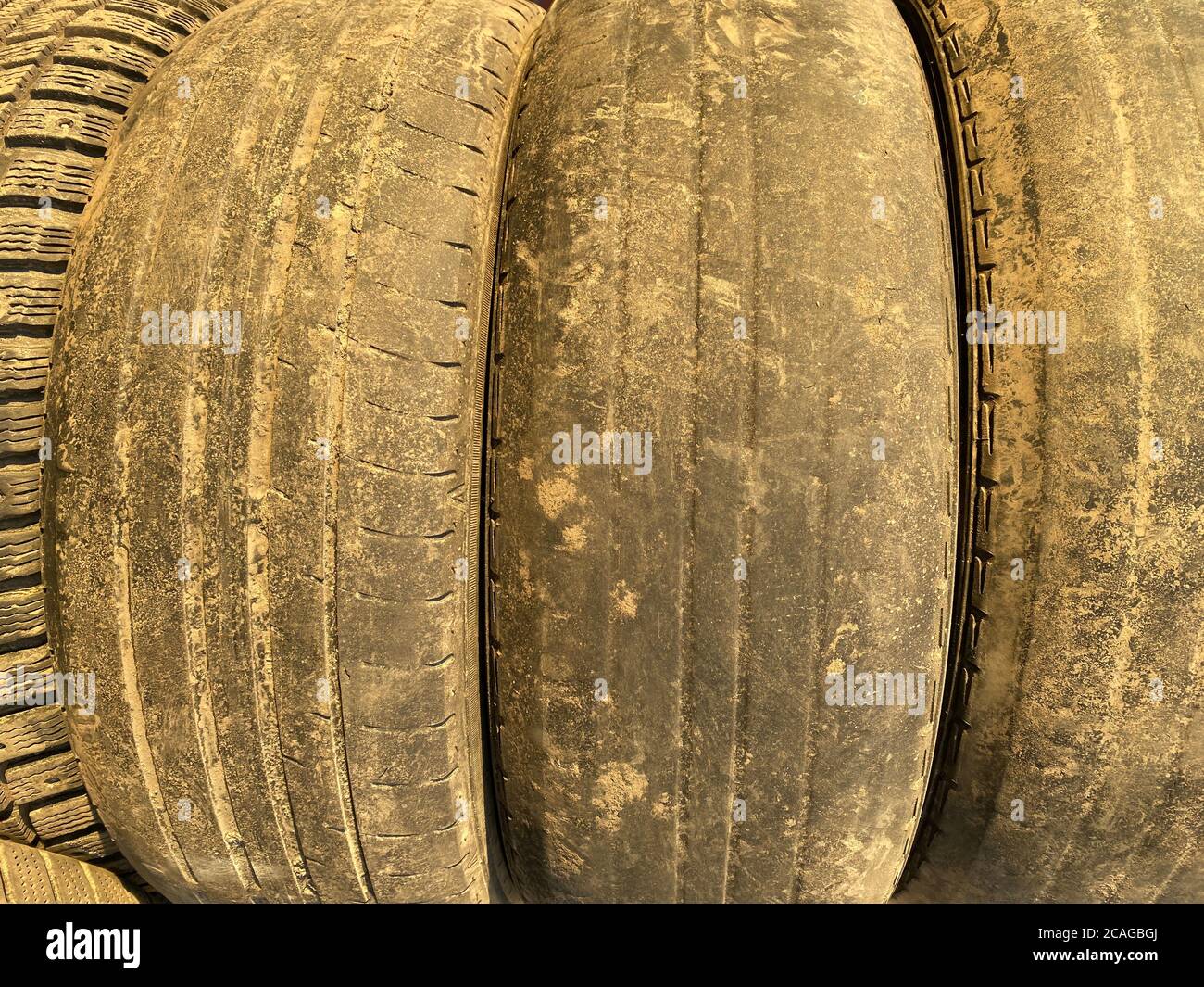 old worn car tires close up Stock Photo - Alamy